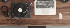 computer, headphones and a turntable